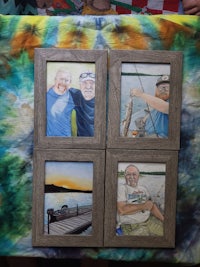 four framed pictures of men fishing on a tie dye tablecloth